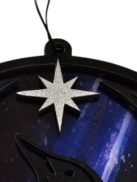 Glittery star for Minnesota Resistance Loon, Minnesota artist, suncatcher, translucent, northern lights. Made by Betsy Skagen of Blue Waters Studio & Emporium. Made in Minnesota.