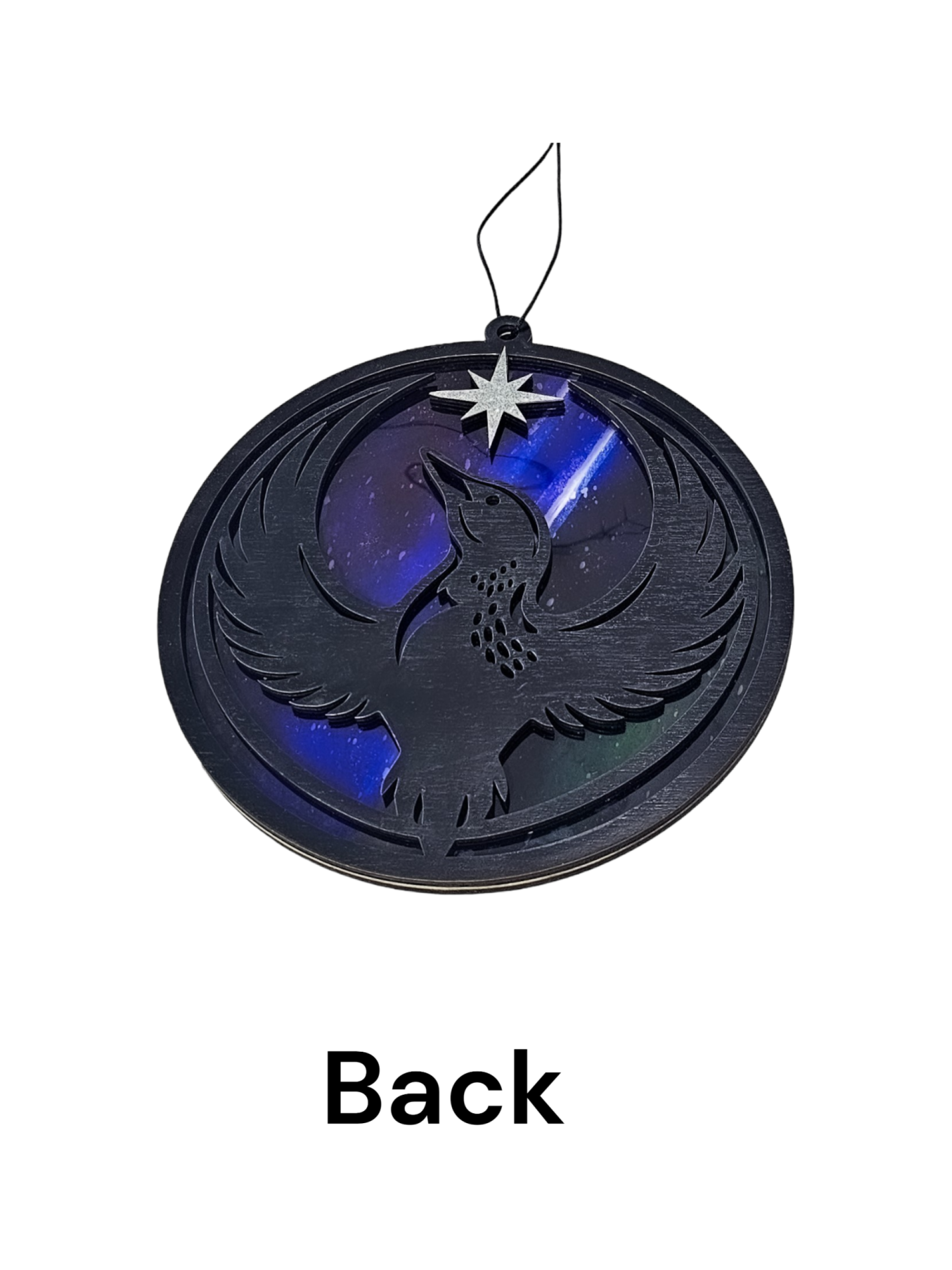 Back side of Minnesota Resistance Loon, Minnesota artist, suncatcher, translucent, northern lights. Made by Betsy Skagen of Blue Waters Studio & Emporium. Made in Minnesota.